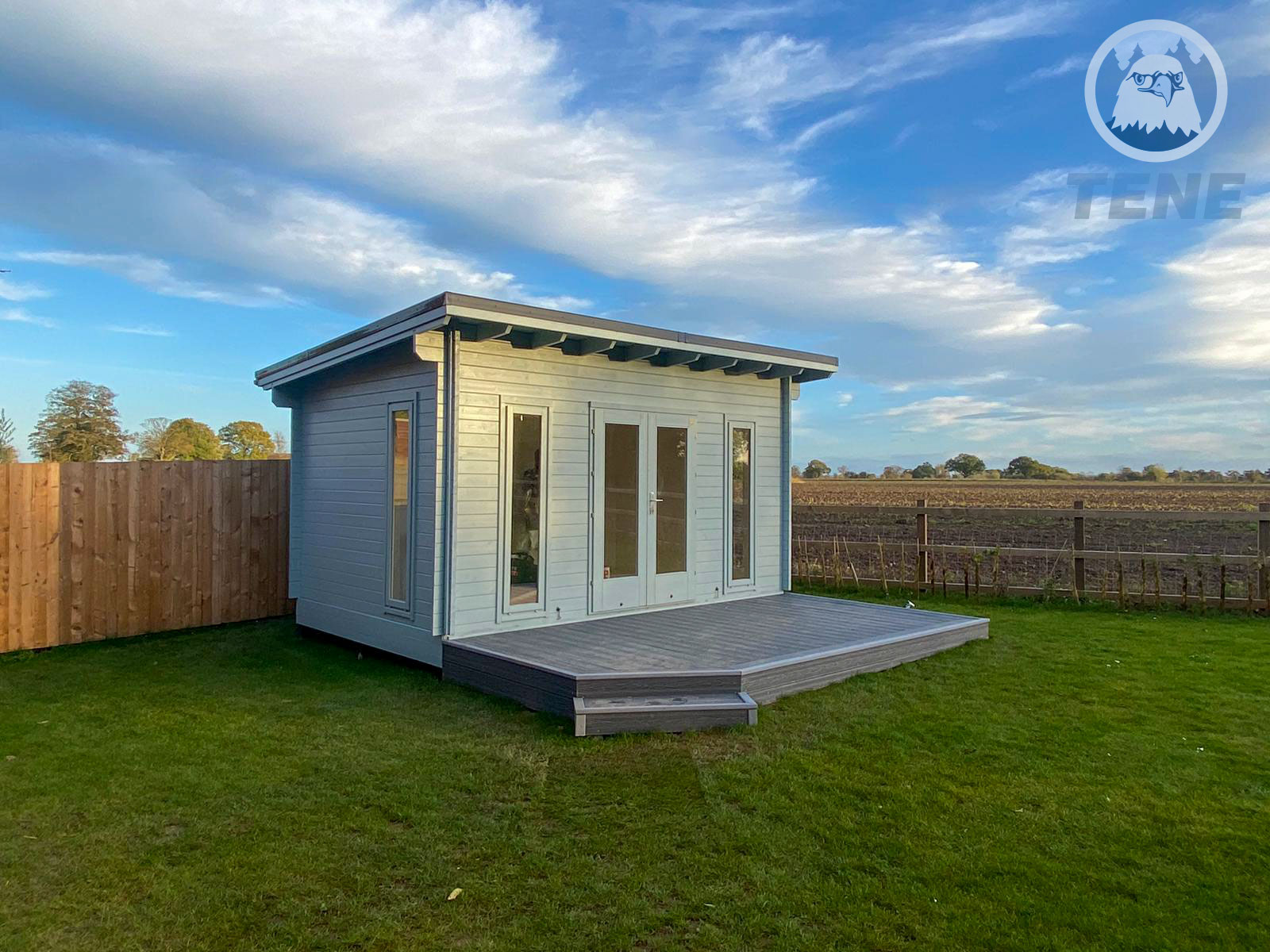 oklahoma-1 a built PacRim Log Structures Oklahoma in a grassy backyard