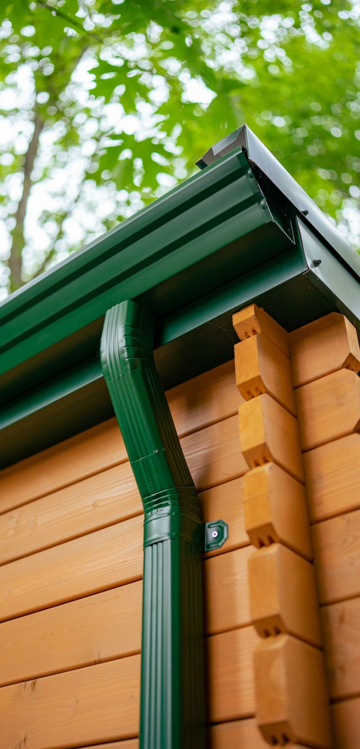 closeup photo of a green gutter built by PacRim Log Structures and Ecklundson Construction for Cowichan Tribes