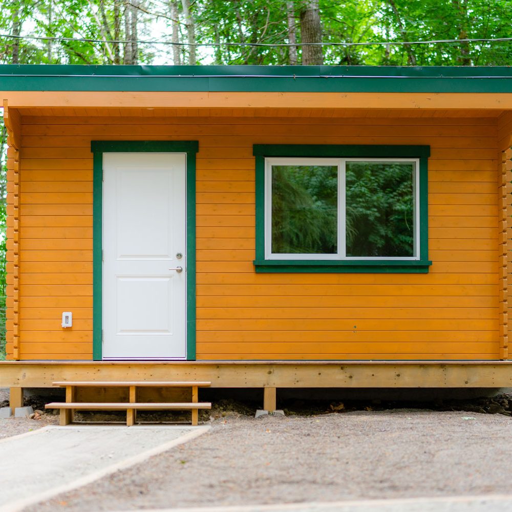 an exterior photo of a PacRim Log Structures unit built for Cowichan Tribes