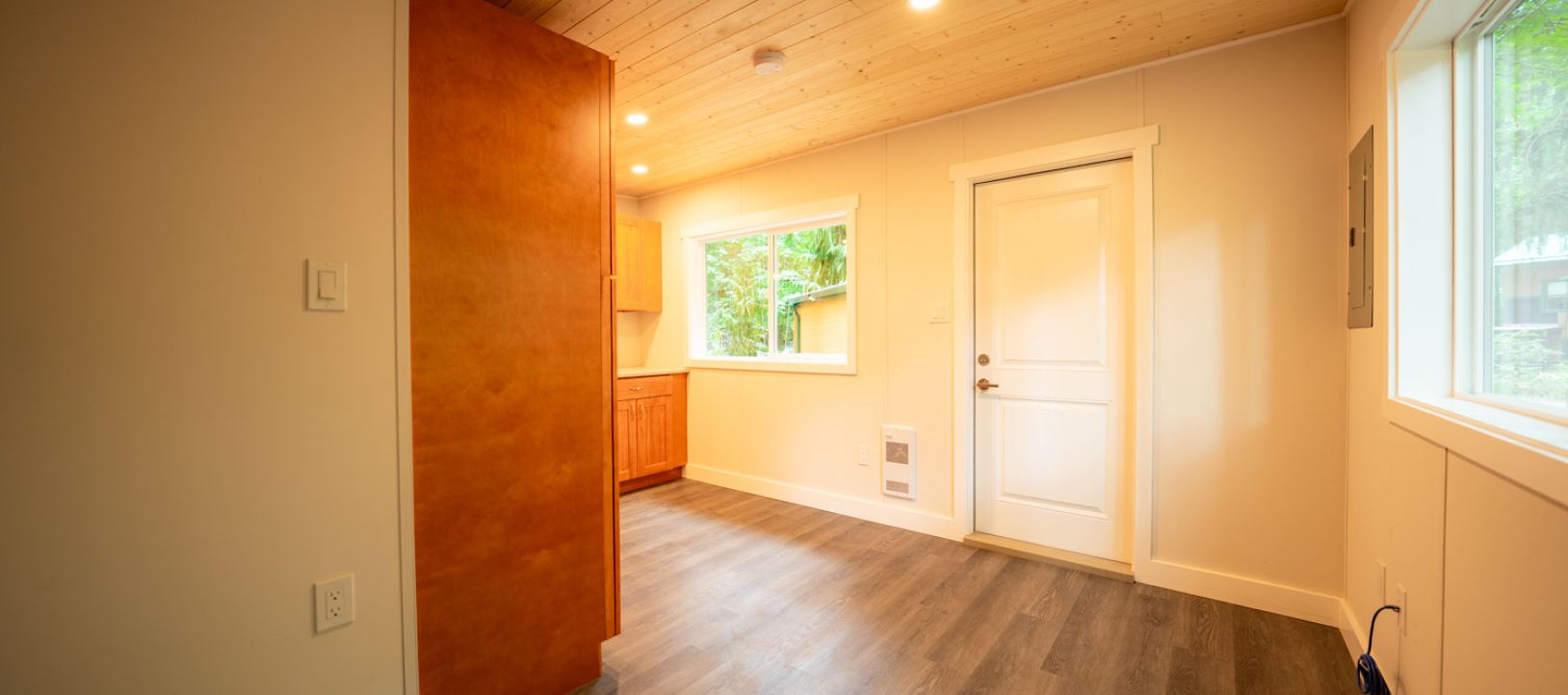 an interior photo showing living quarters built by PacRim Log Structures and Ecklundson Construction for Cowichan Tribes