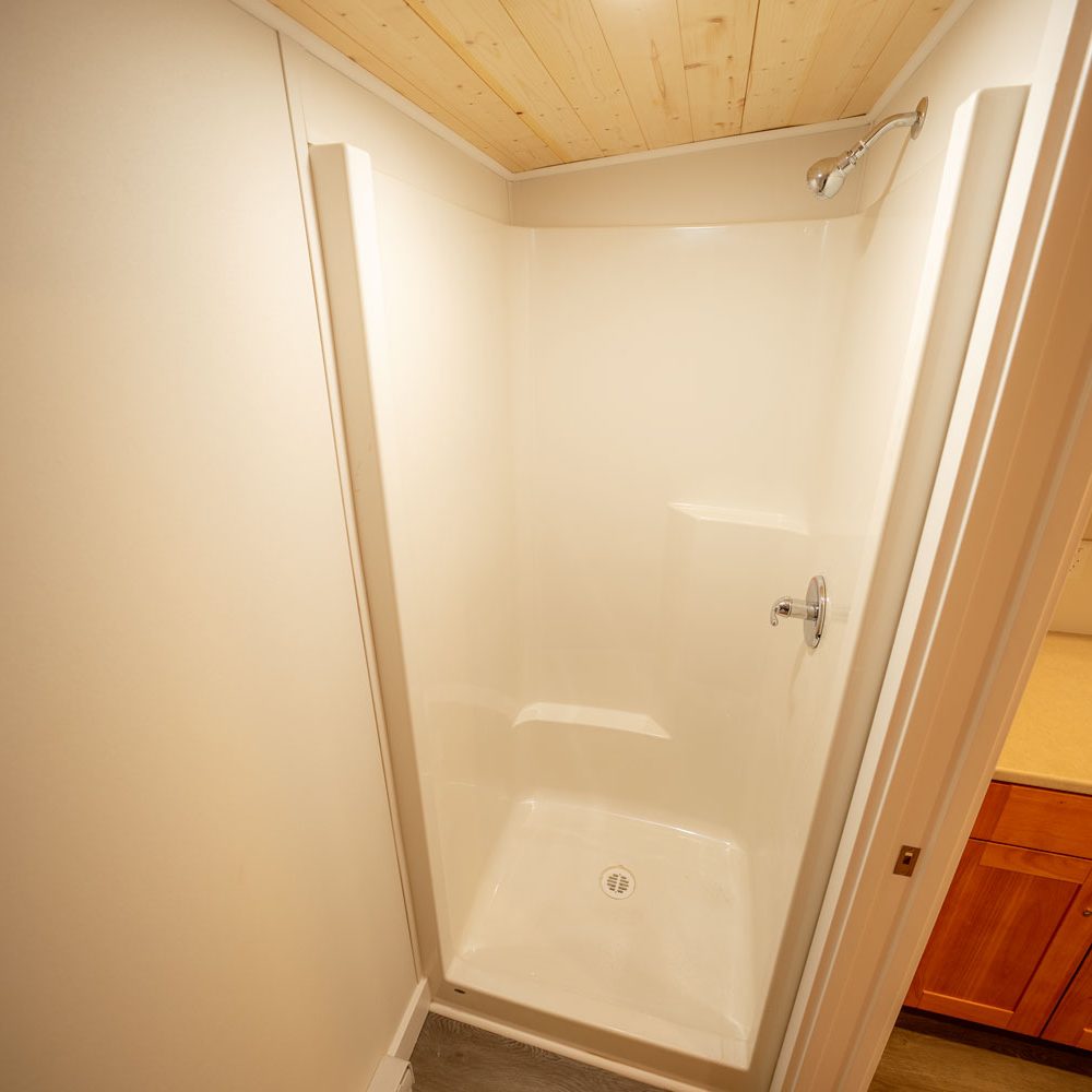 an interior photo showing the bathroom built by PacRim Log Structures and Ecklundson Construction for Cowichan Tribes