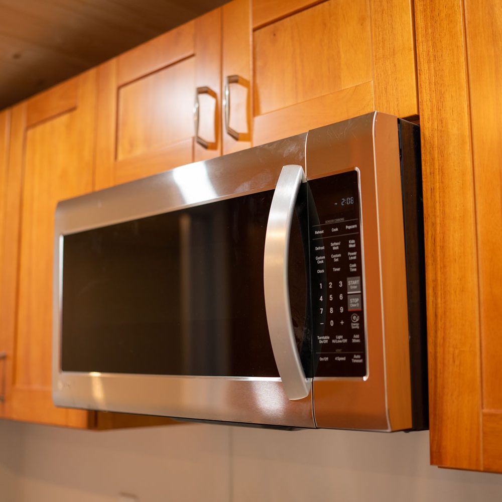 an interior photo showing a kitchen built by PacRim Log Structures and Ecklundson Construction for Cowichan Tribes